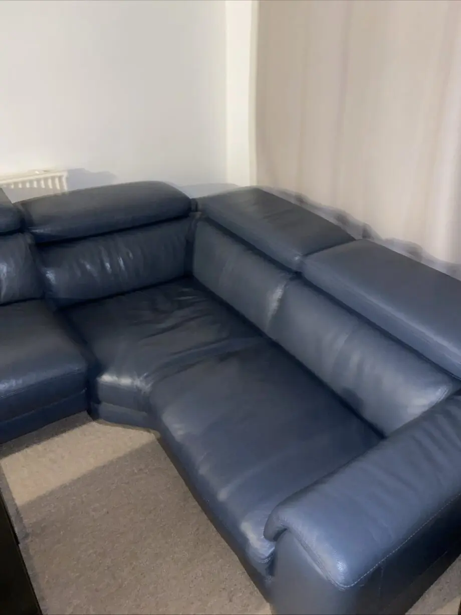 Beautiful Leather DFS Corner recliner with footstool