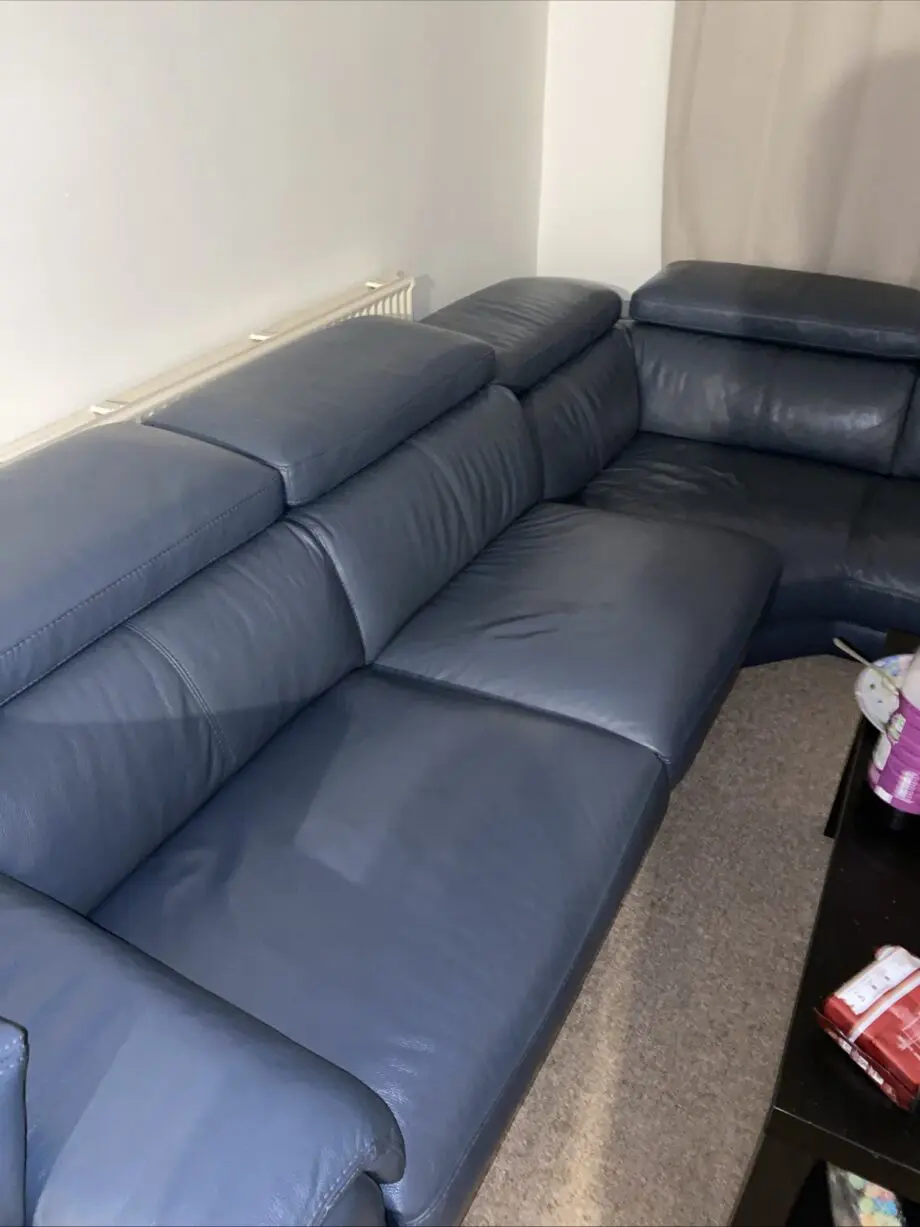 Beautiful Leather DFS Corner recliner with footstool