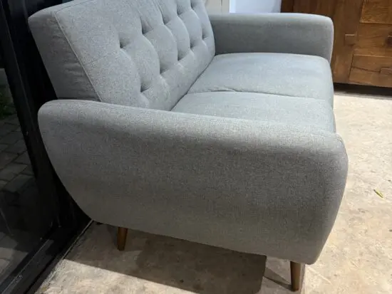 Grey two seater sofa