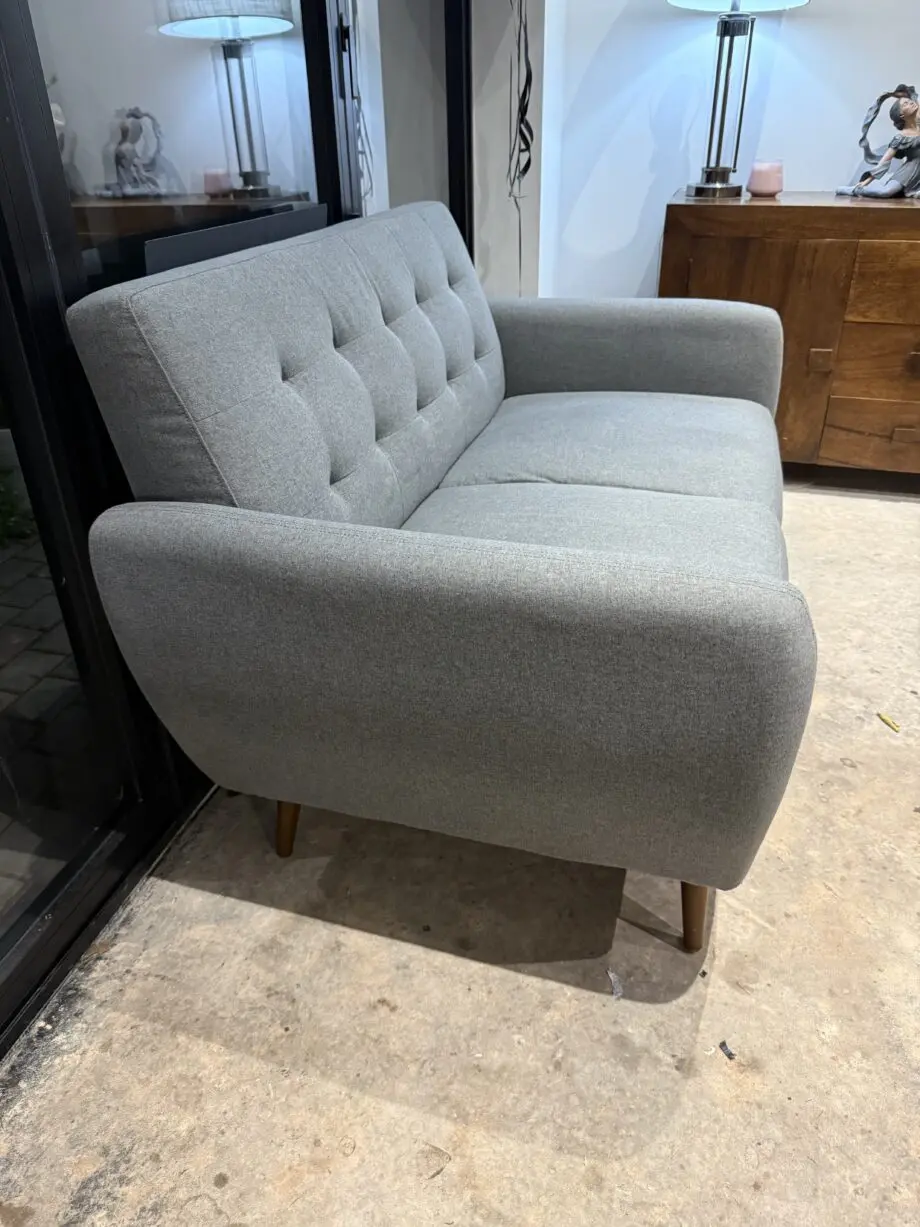 Grey two seater sofa