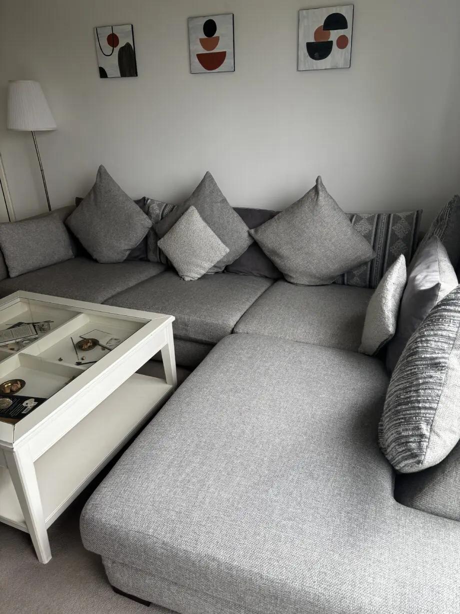 DFS grey corner sofa with pillows included