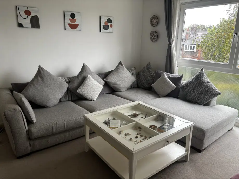 DFS grey corner sofa with pillows included