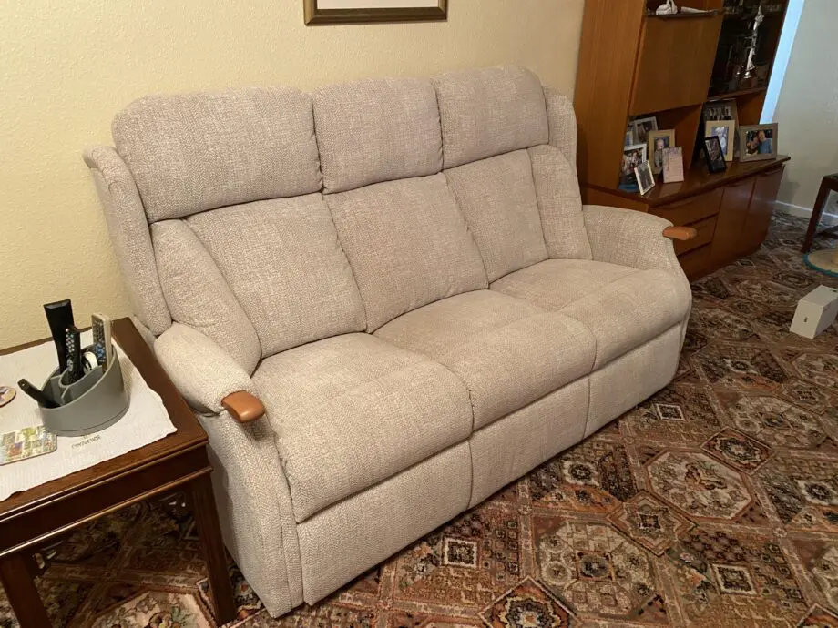 Virtually new Three seater sofa.