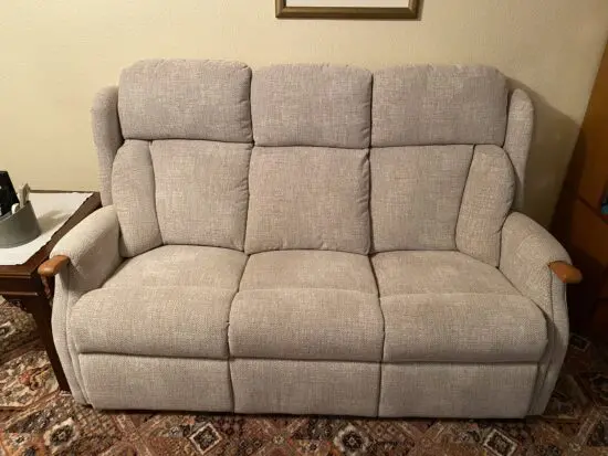 Virtually new Three seater sofa.