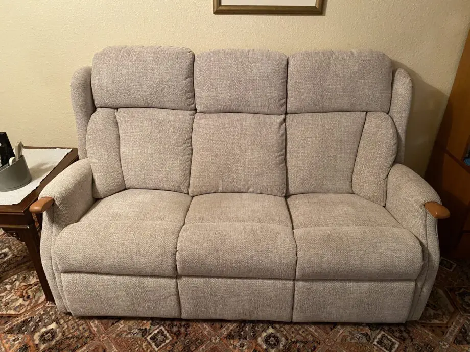 Virtually new Three seater sofa.