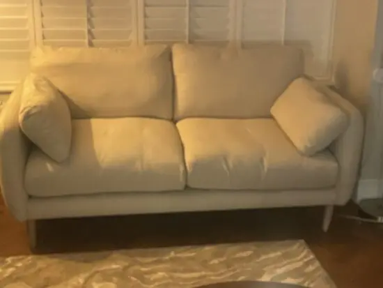 2 seater cream sofa