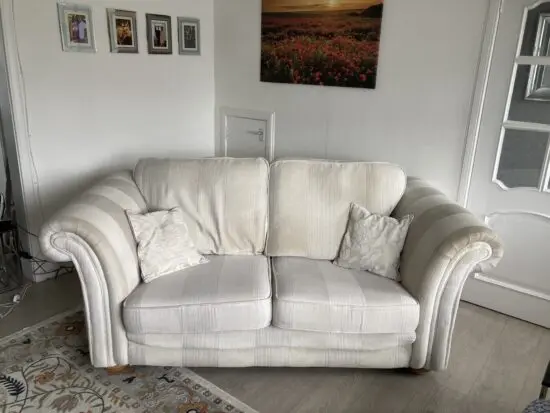 2 comfortable sofas and footstool