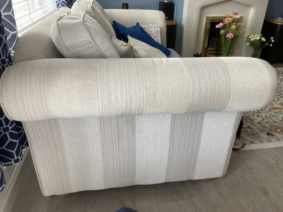 2 comfortable sofas and footstool