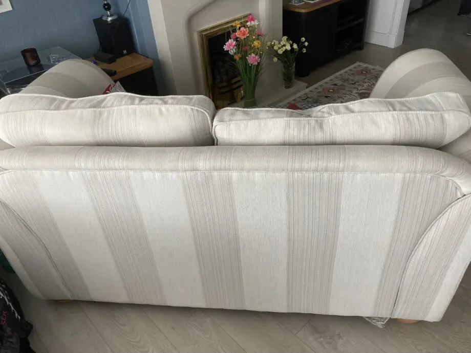 2 comfortable sofas and footstool