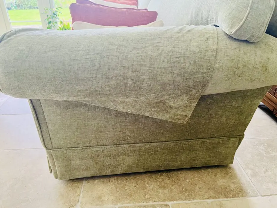Newly upholstered pale sage 2 seater sofa
