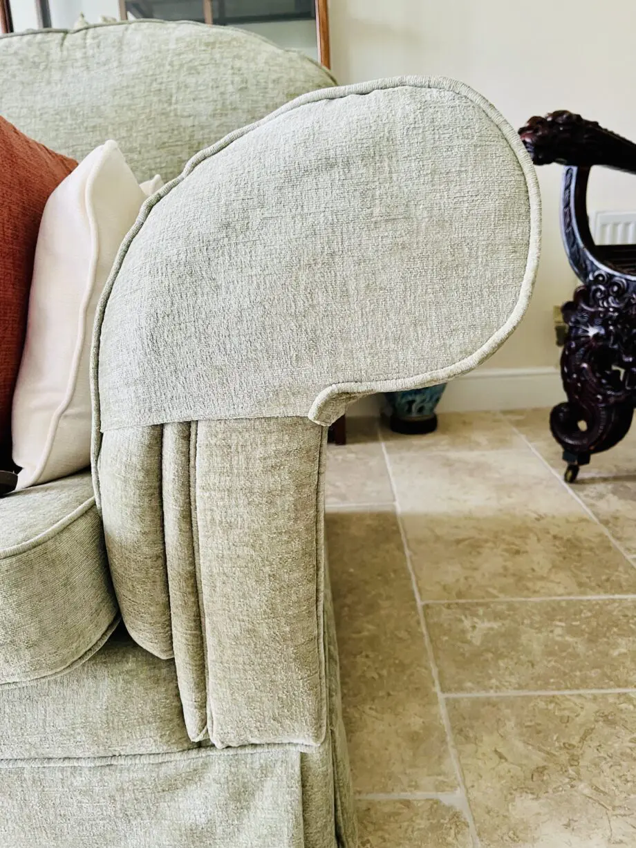 Newly upholstered pale sage 2 seater sofa