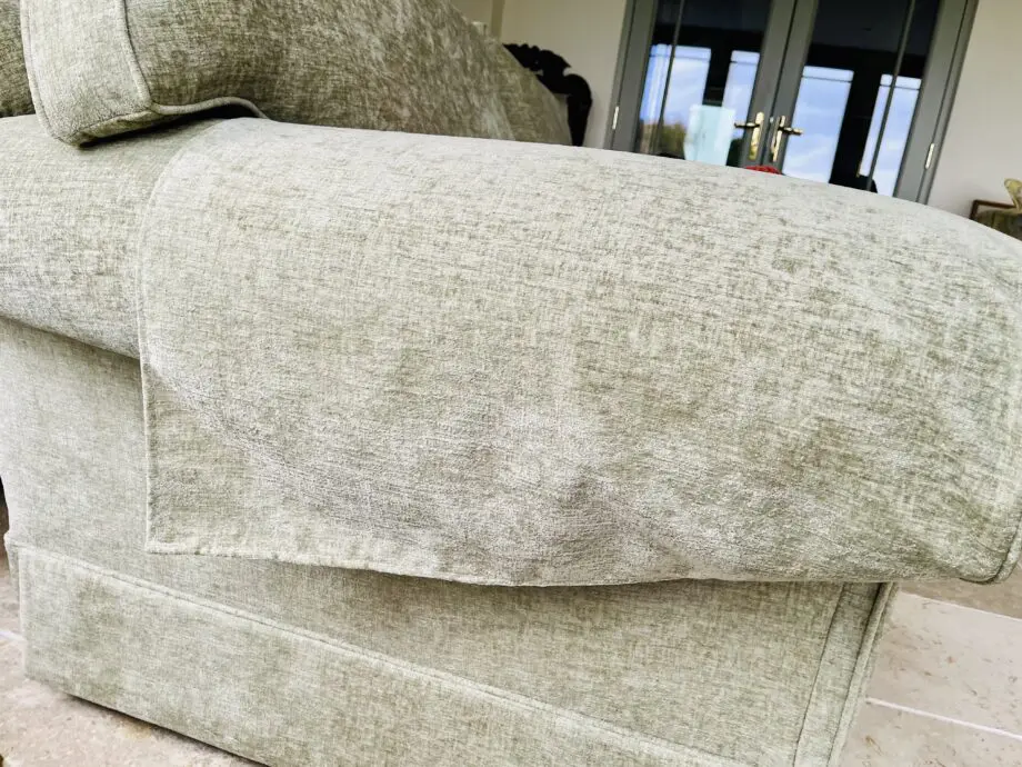 Newly upholstered pale sage 2 seater sofa