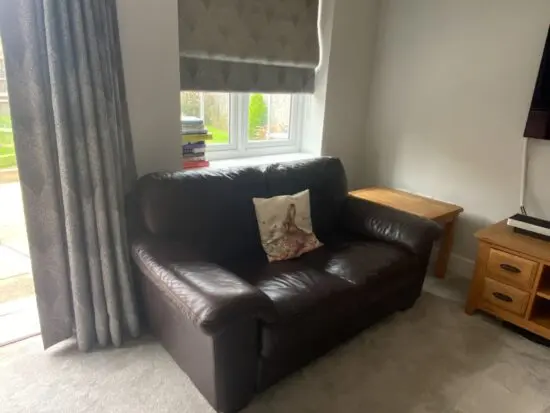 Brown 2 seater leather sofa
