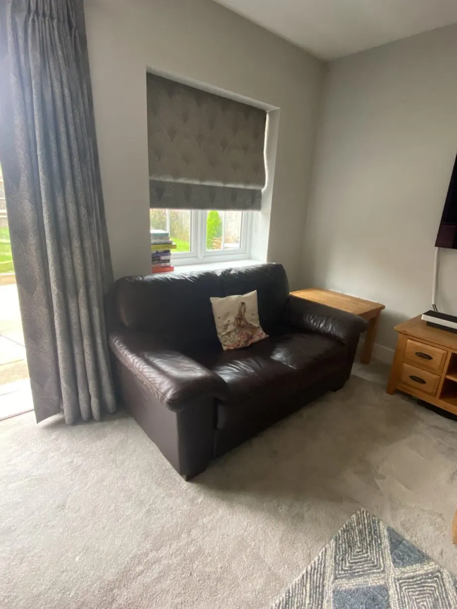 Brown 2 seater leather sofa