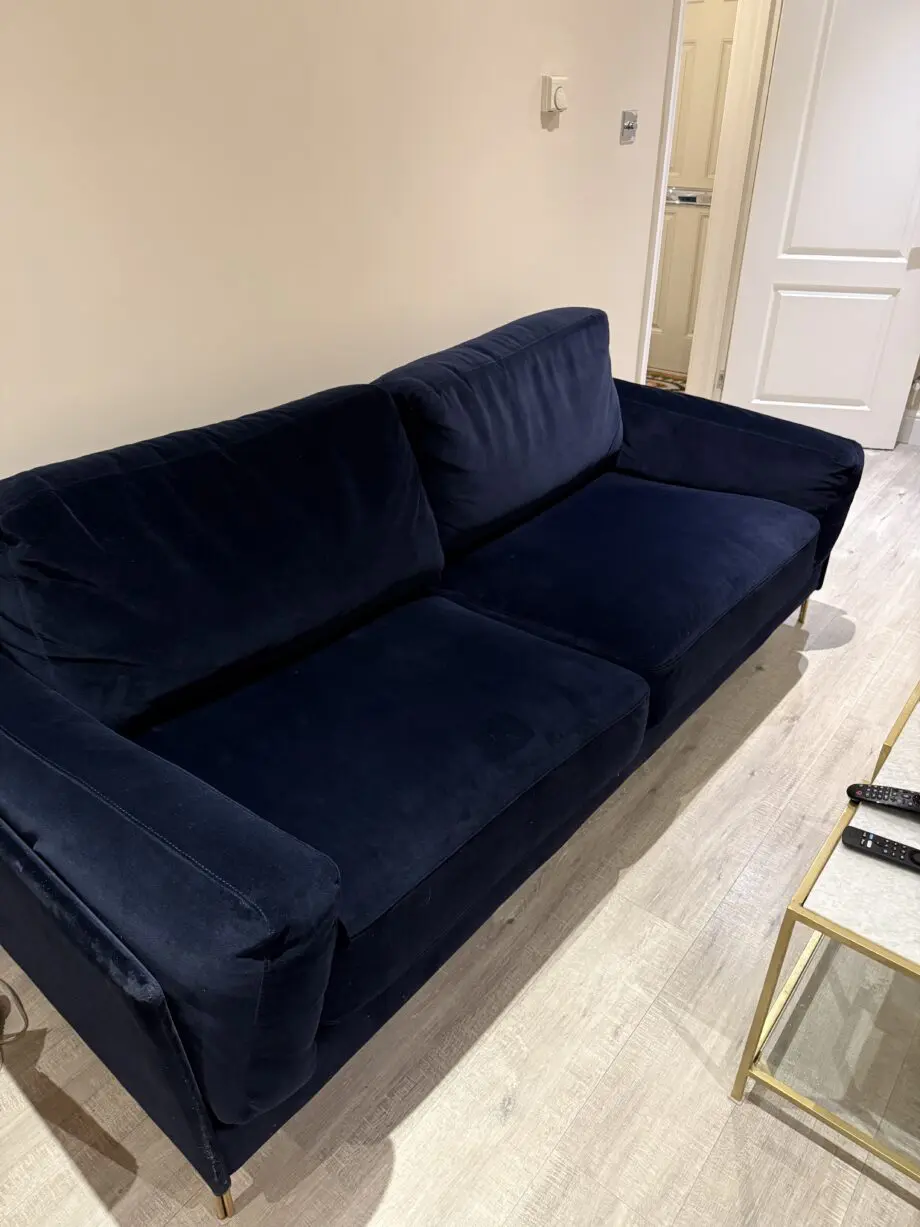 Navy blue velvet like fabric sofa