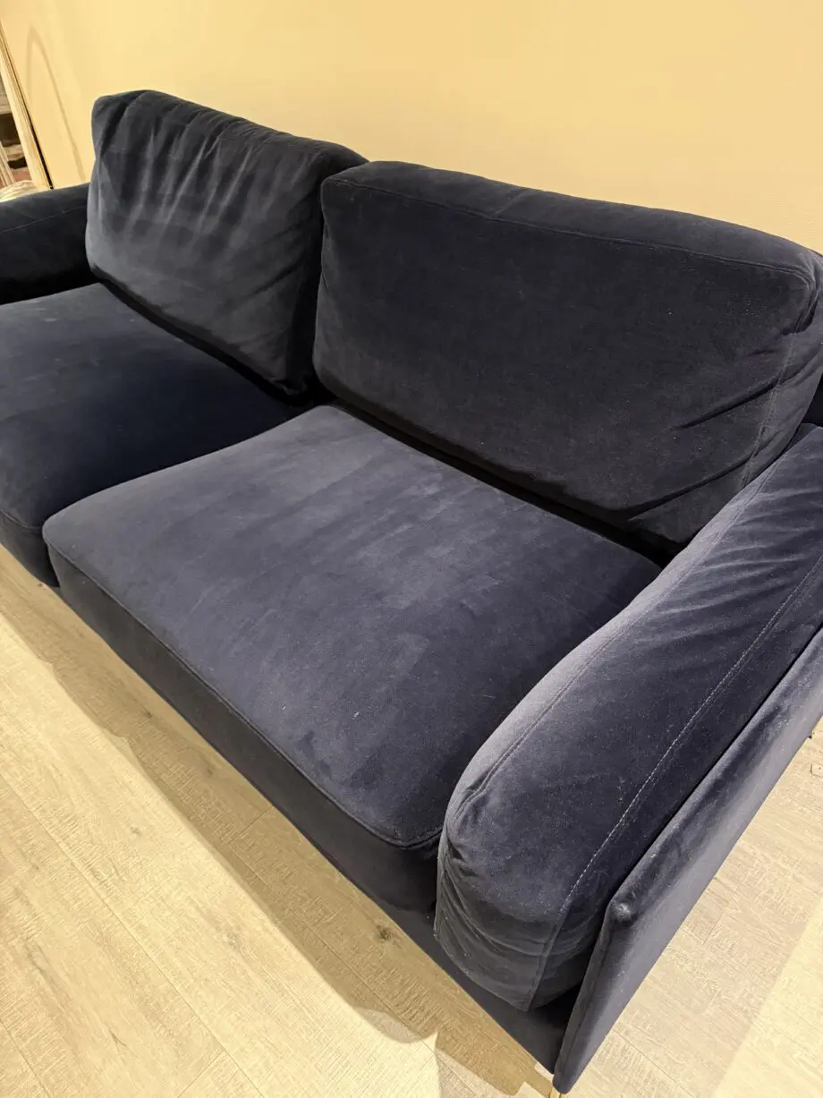 Navy blue velvet like fabric sofa