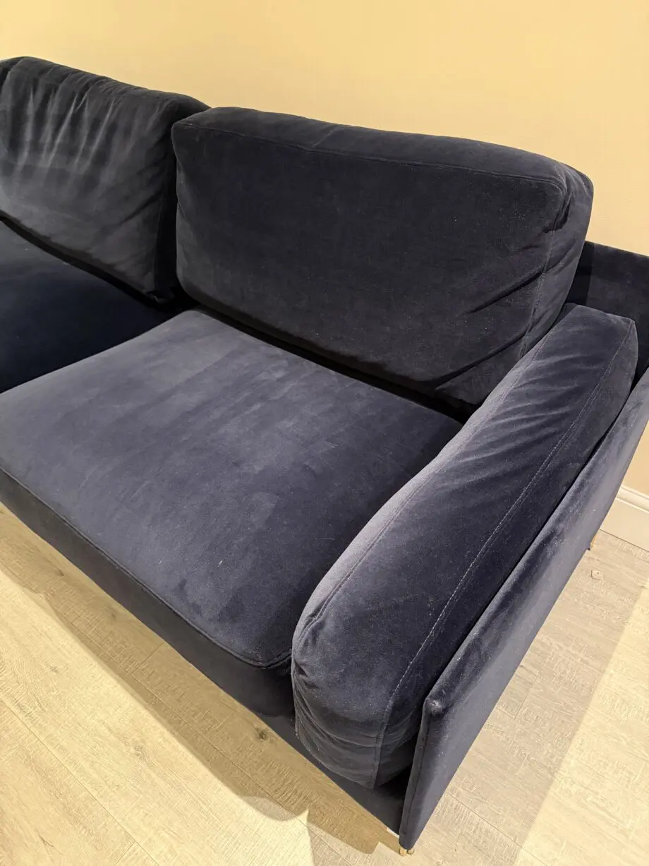 Navy blue velvet like fabric sofa