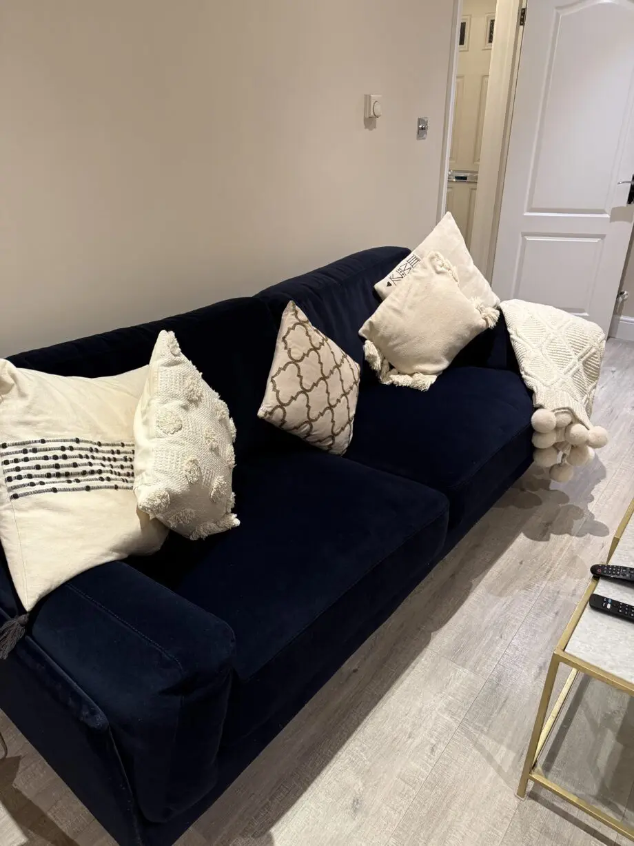 Navy blue velvet like fabric sofa