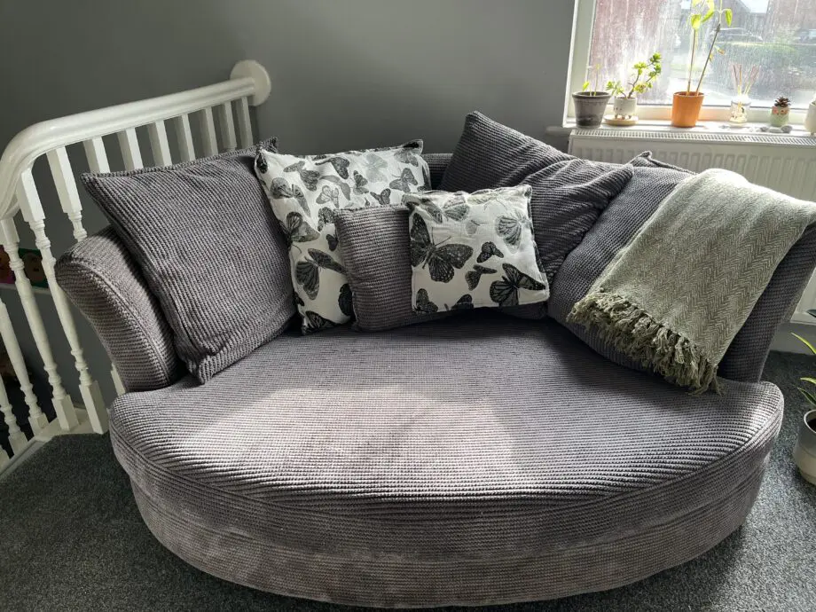 DFS Grey Cuddle Sofa with Footstool.