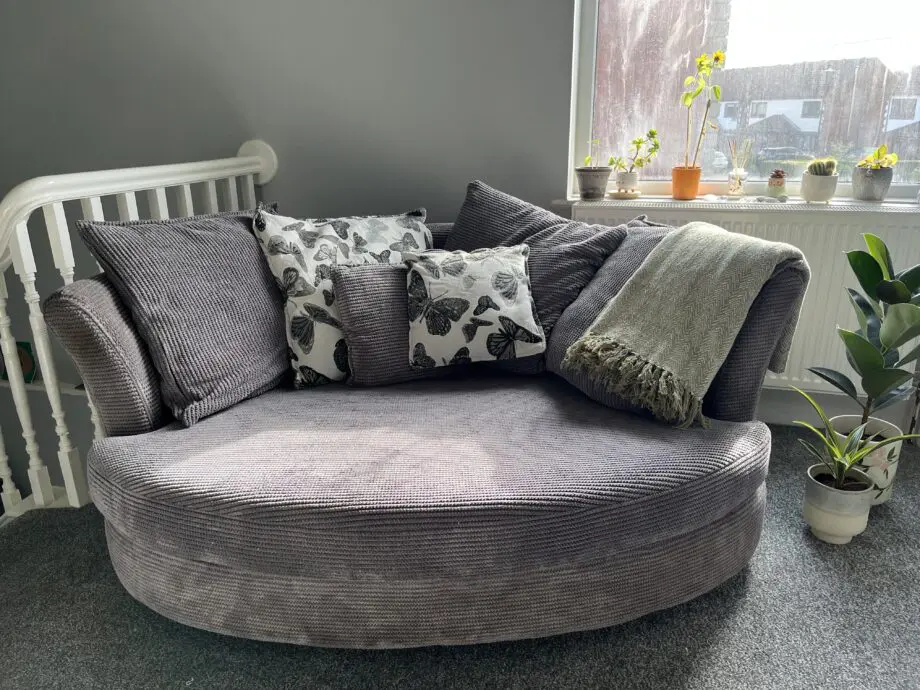DFS Grey Cuddle Sofa with Footstool.