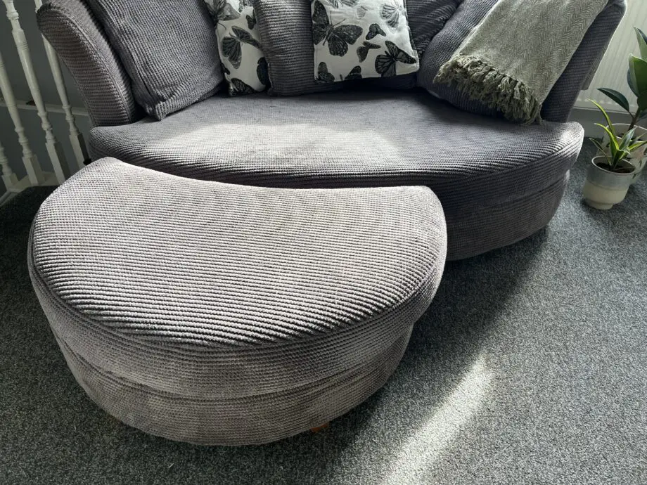 DFS Grey Cuddle Sofa with Footstool.