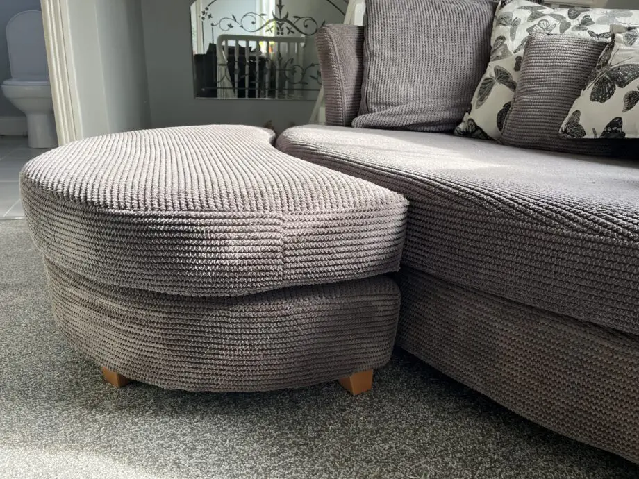DFS Grey Cuddle Sofa with Footstool.