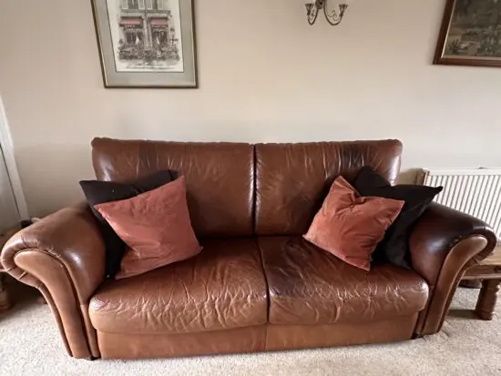 Chestnut brown leather 3 seater settees. solid wood frames