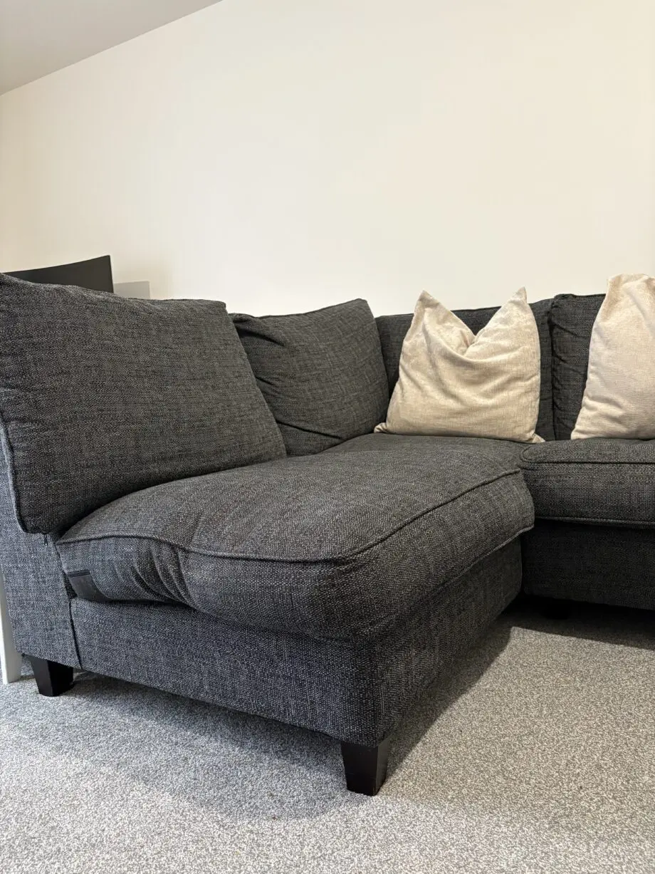 Dark grey fabric corner sofa