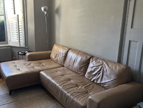 Tan leather left hand chaise sofa by Made