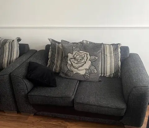 Beautiful charcoal grey two seater sofa