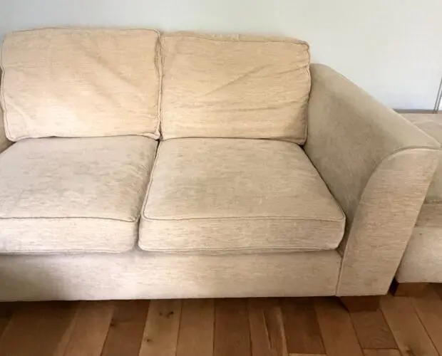 2 x beige 2 seater sofas with ottoman pouffe