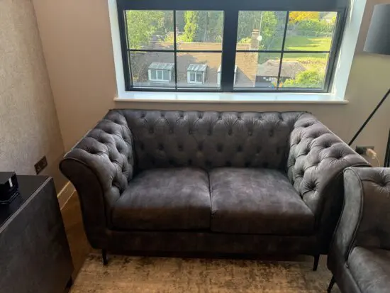 Green 2 seater sofa