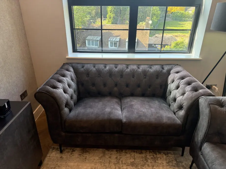 Green 2 seater sofa
