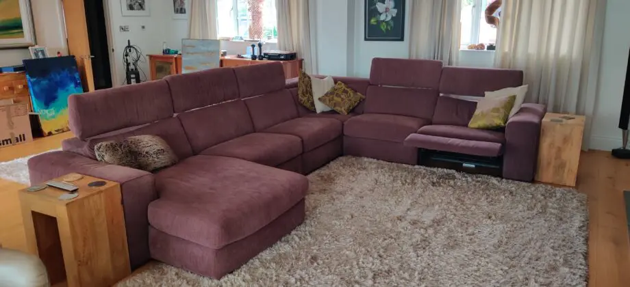 Natuzzi large corner Clyde sofa maroon fabric with foot rests