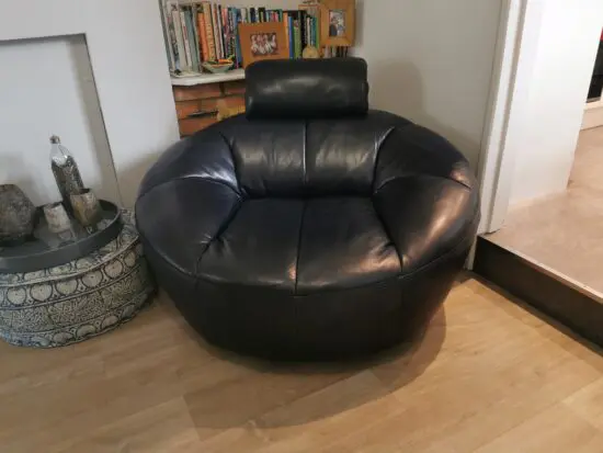 La-Z-Boy circular navy blue swivel chair