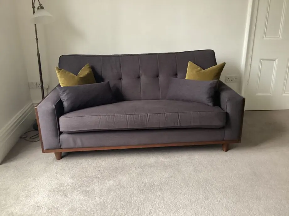 Two G Plan Vintage Agatha small 2.5 seat sofas and footstool
