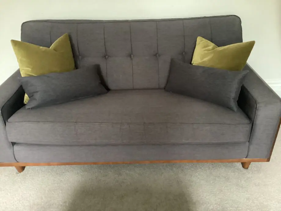 Two G Plan Vintage Agatha small 2.5 seat sofas and footstool