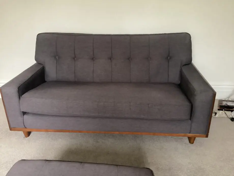 Two G Plan Vintage Agatha small 2.5 seat sofas and footstool