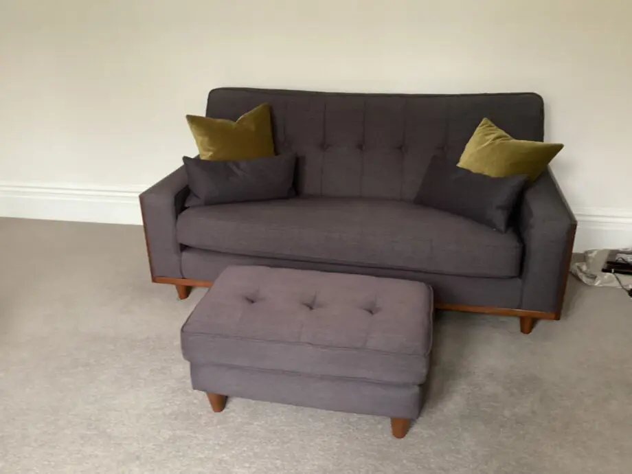 Two G Plan Vintage Agatha small 2.5 seat sofas and footstool