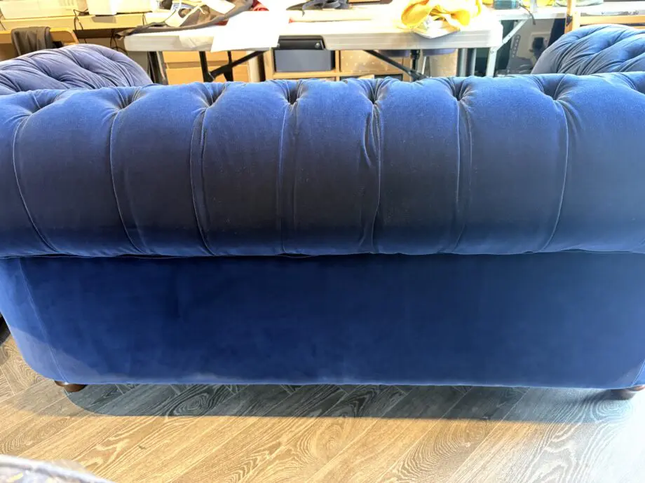 2 x Navy Velvet Chesterfield Sofas & Footstall excellent condition