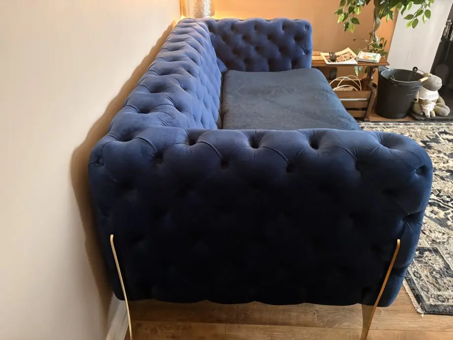 Royal blue chesterfield style sofa