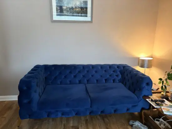 Royal blue chesterfield style sofa