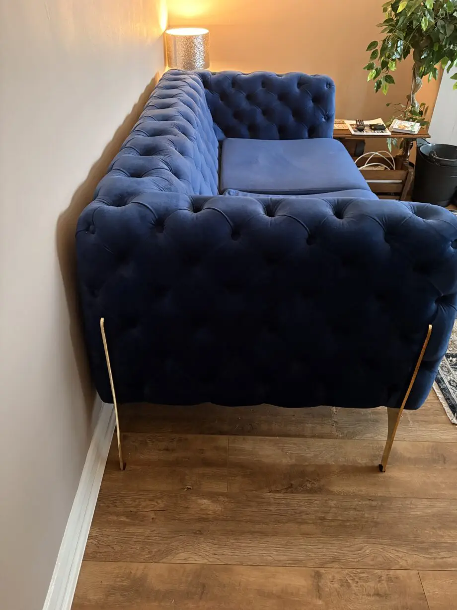 Royal blue chesterfield style sofa