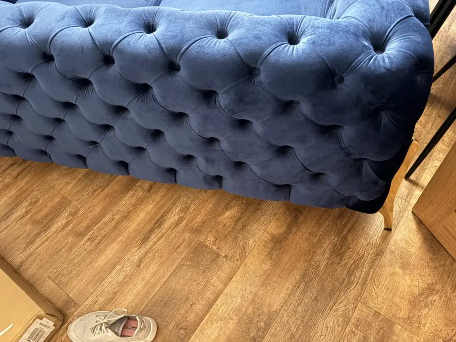 Royal blue chesterfield style sofa