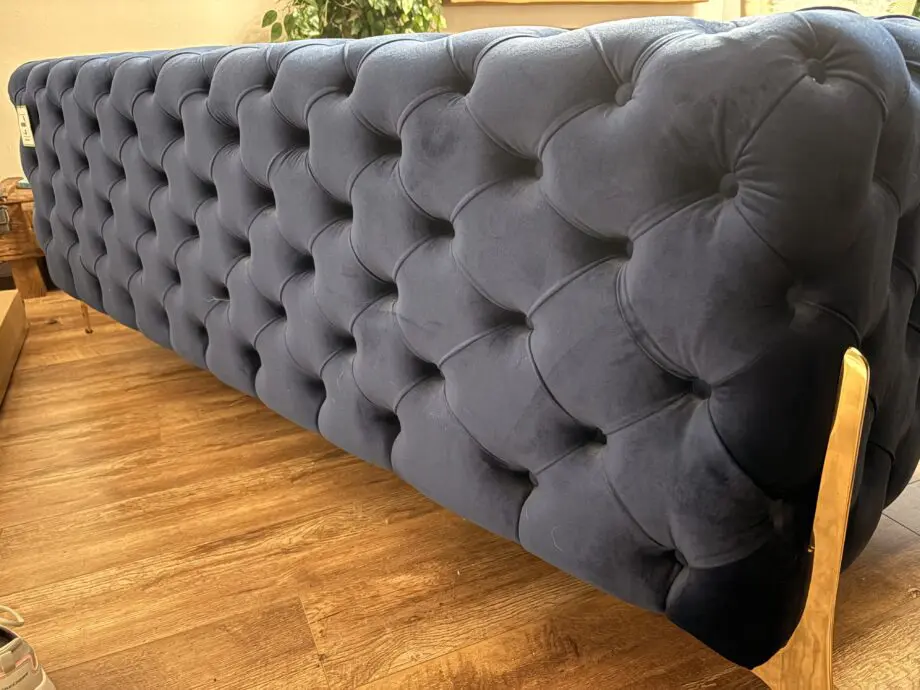 Royal blue chesterfield style sofa