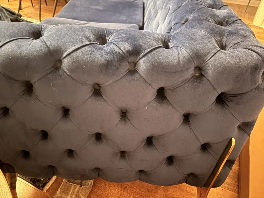 Royal blue chesterfield style sofa