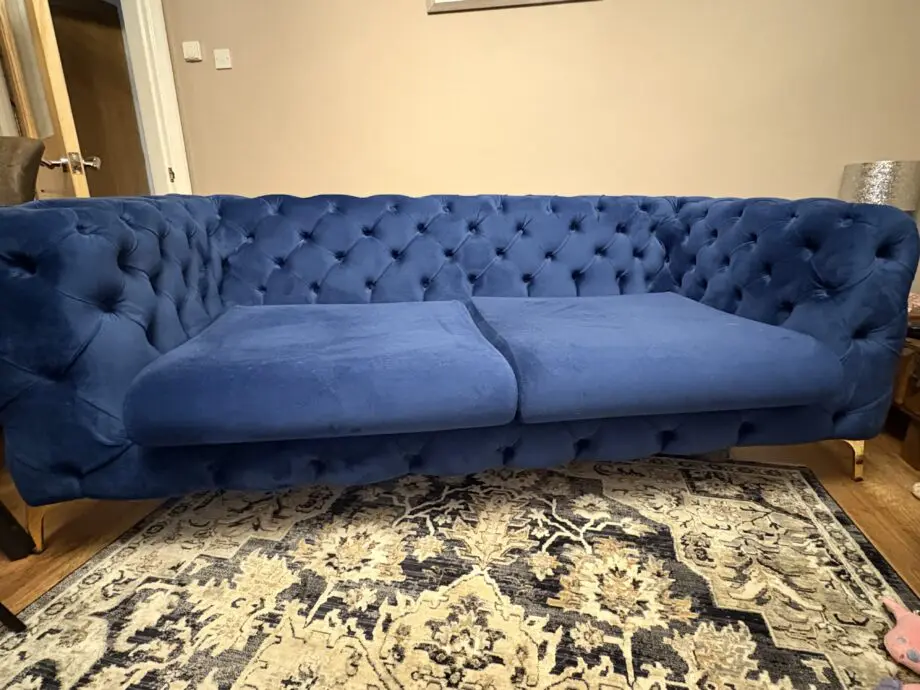Royal blue chesterfield style sofa