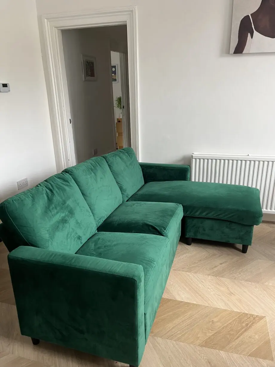 Daals three seater green velvet chaise sofa