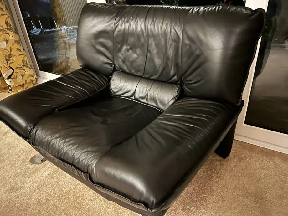 DFS Vintage Nicoletti Italian stylish chair Black leather with curved chrome legs