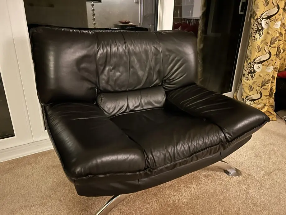 DFS Vintage Nicoletti Italian stylish chair Black leather with curved chrome legs